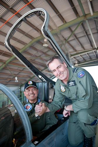 Australian Chief of Air Force, AIRMSHL Geoff Brown warmly reciprocates ACM Imam Sufaat's hospitality (during his March 2012 visit to Makassar) by hosting AIRMSHL Dede Rusamsi on a tour of the "Hornets' Nest" in Darwin